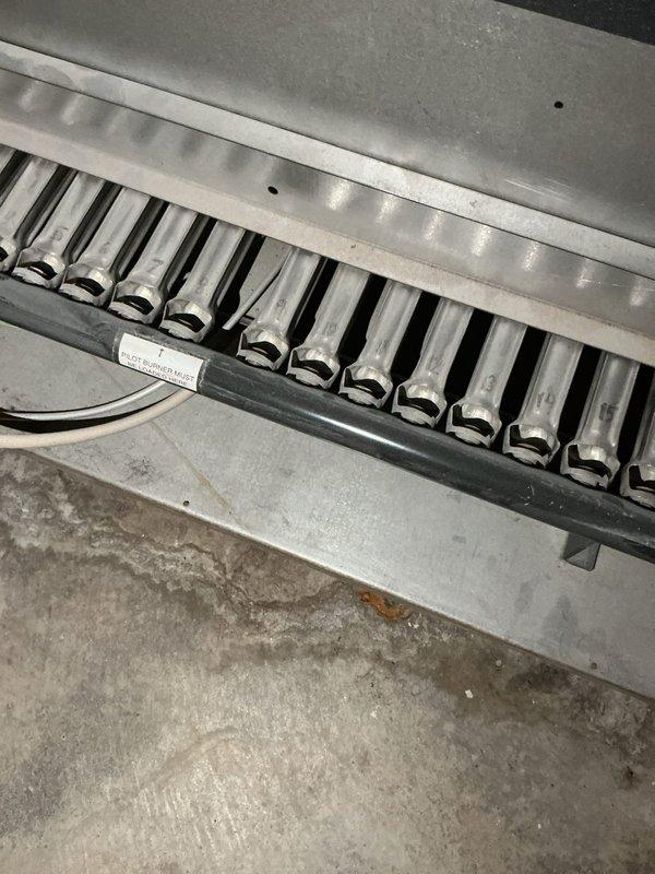 Completed comprehensive boiler maintenance inspection including examination of burner assembly, heat exchanger tubes, and hydronic distribution system. Verified proper operation of all zone circulators, control valves, and manifold connections throughout the copper piping network. All components found to be in satisfactory working condition with no immediate service requirements identified.