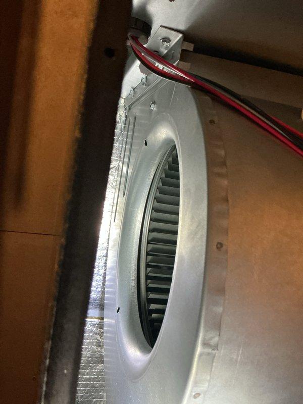 Completed comprehensive heating system maintenance inspection on residential HVAC unit. Performed thorough examination of electrical panel connections, verifying proper circuit breaker operation and wire terminations for the heating system. Inspected ceiling-mounted return air vent, ductwork insulation, and air handler plenum in utility area, confirming all components were properly secured and functioning correctly. All electrical connections, ductwork, and ventilation components found to be in good working order with no issues requiring immediate attention.