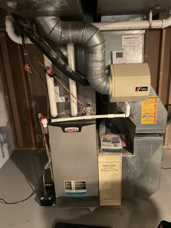 Completed comprehensive heating maintenance on Lennox furnace system. Performed full inspection of unit, ductwork, and associated components including humidifier and condensate pump assembly. Verified proper operation of all mechanical and safety systems, confirmed adequate drainage through PVC condensate lines, and ensured all connections were secure throughout the heating system.