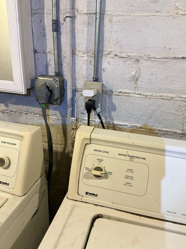 Performed comprehensive electrical inspection of residential property. Verified proper electrical connections and outlet functionality in laundry area, including dual washing machine hookups with appropriate wiring and conduit installation. Inspected kitchen electrical system, confirming refrigerator circuit and all associated outlets met code requirements and were operating safely.