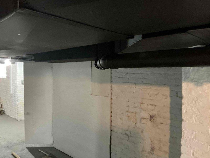 Responded to service call for complete furnace failure. Upon inspection, found existing heating system inoperable and beyond economical repair. Evaluated installation site including basement mechanical space with existing ductwork infrastructure and copper refrigerant lines. Assessed structural conditions including exposed I-beam supports and concrete block foundation walls showing moisture intrusion evidence. Provided customer with replacement furnace options and specifications based on existing HVAC configuration and space requirements. Documented current system layout and mechanical room conditions for equipment replacement planning.