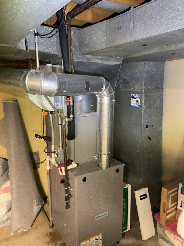 Completed scheduled heating maintenance on residential forced-air furnace system with integrated Aprilaire whole-house humidifier. Performed comprehensive inspection of furnace unit, verified proper operation of all components, checked ductwork connections and seals, and confirmed humidifier functionality and water supply line integrity. All systems operating within normal parameters with no deficiencies noted.
