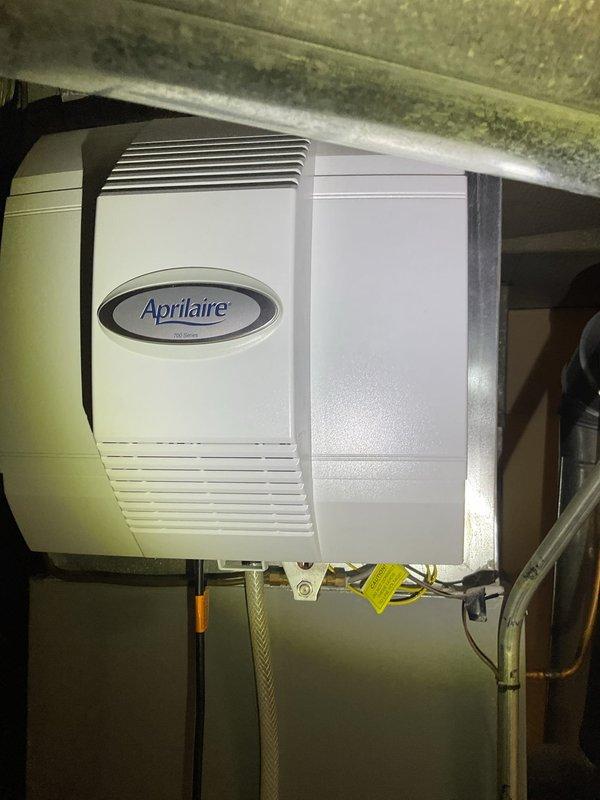 Completed scheduled heating maintenance on residential forced-air furnace system with integrated Aprilaire whole-house humidifier. Performed comprehensive inspection of furnace unit, verified proper operation of all components, checked ductwork connections and seals, and confirmed humidifier functionality and water supply line integrity. All systems operating within normal parameters with no deficiencies noted.