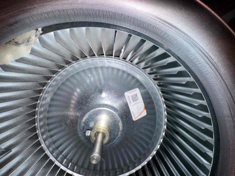 Responded to callback for persistent squealing noise that predated recent furnace replacement. Inspected blower assembly and motor components to identify source of noise captured by customer on audio/video. Examined blower wheel, housing, and electrical connections to diagnose pre-existing sound issue unrelated to new equipment installation.
