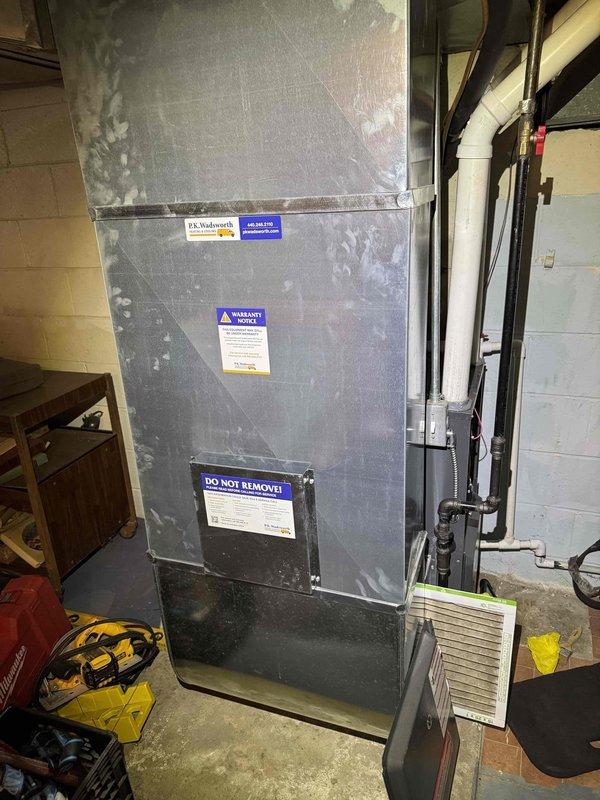 # HVAC Heating Maintenance Completed

Performed annual preventive maintenance service on residential forced-air furnace system as part of scheduled maintenance program. Conducted comprehensive inspection of all major components including heat exchanger, burner assembly, blower motor, and electrical connections. Verified proper operation of safety controls and limit switches.

Replaced existing air filter with new pleated media filter to ensure optimal airflow and system efficiency. Inspected filter housing and confirmed proper seal to prevent air bypass. Cleaned accessible interior components and removed accumulated dust and debris from unit exterior and surrounding area.

Tested system startup sequence and verified ignition operation. Monitored system performance during full heating cycle to confirm proper temperature rise and airflow distribution. All components found to be operating within manufacturer specifications with no deficiencies noted. System left in full operational status