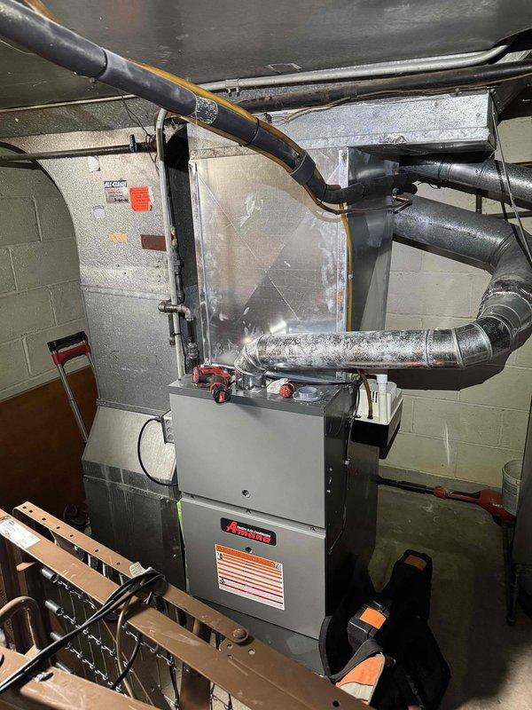 # HVAC Heating Maintenance Completed

Performed annual preventive maintenance on residential Amana furnace system as part of scheduled service plan. Conducted comprehensive inspection of heating equipment, hydronic heating distribution manifold with multiple zone control valves, ductwork connections, and associated mechanical components. All system components were inspected, tested for proper operation, and found to be functioning within normal parameters. Documentation photos captured for service records.