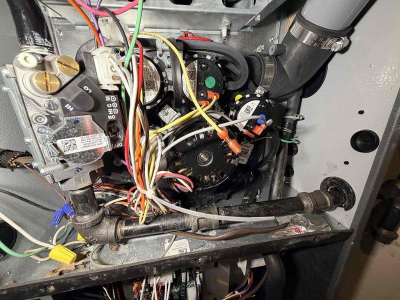 Completed annual preventative maintenance visit on residential furnace system as part of scheduled maintenance program. Performed comprehensive inspection of all heating components including blower assembly, motor, heat exchanger, and electrical connections. Verified proper operation of draft inducer motor and blower wheel, confirming no debris accumulation or mechanical wear. Inspected control board and all wire harnesses for secure connections and signs of heat damage or deterioration. All electrical connections tested and found secure with proper voltage readings. System operational testing confirmed furnace cycling properly with all safety controls functioning as designed.