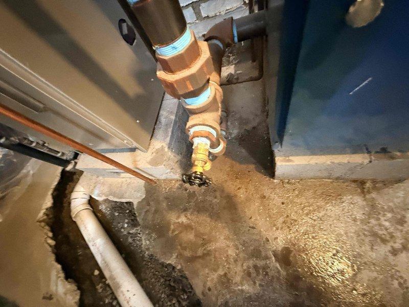 Responded to no heat call where homeowner reported boiler failure potentially caused by another contractor's underground plumbing work in basement. Upon arrival, inspected blue residential boiler unit and associated electrical wiring for damage or disconnections. Verified power supply to unit, checked control wiring connections, and examined thermostat circuit for breaks or loose connections that may have occurred during excavation work. Traced electrical runs and confirmed all safety controls, limit switches, and transformer connections were intact. Restored power to boiler, verified proper ignition sequence, and confirmed unit returned to normal heating operation. Documented existing mechanical room conditions with photographs showing copper piping, gas connections, and electrical infrastructure. Unit tested successfully with no further issues noted at time of service.