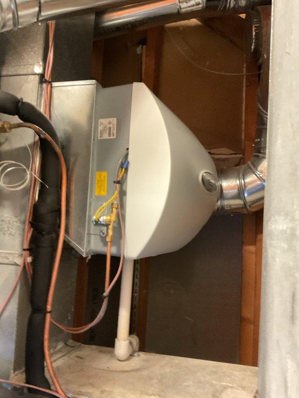 Completed scheduled preventive maintenance on residential gas furnace heating system. Performed comprehensive inspection of blower motor assembly, burner components, heat exchanger, and electrical connections. Verified proper operation of integrated whole-home humidifier unit and associated ductwork. Inspected refrigerant lines, control wiring, and electrical panel connections. All components found to be in functional condition with proper connections maintained throughout the system.
