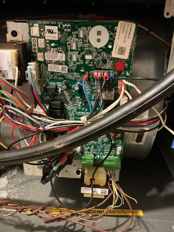 Completed scheduled heating maintenance on HVAC system. Performed inspection of control board assembly, verifying proper operation of circuit boards (REV 002), control components, and wiring connections. Examined Clean Comfort indoor air quality unit and associated ductwork for proper function. All electrical connections, terminal blocks, and safety indicators found in good working condition with no issues identified.