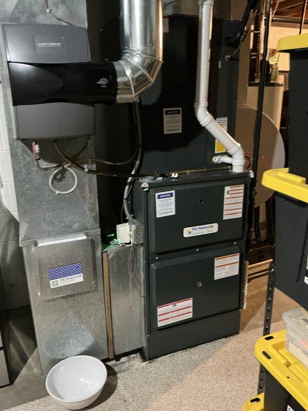 Completed comprehensive preventive maintenance service on residential HVAC system including furnace and air conditioning components. Performed full system inspection of multi-section furnace unit, air handler with filtration system, and associated ductwork. Inspected and verified proper operation of UV-C air purification system mounted in mechanical room. Checked all electrical connections, refrigerant lines, condensate drainage, and ductwork sealing. Replaced air filter, cleaned evaporator coil, and verified proper airflow throughout system. Tested all safety controls and confirmed system operating within manufacturer specifications for upcoming cooling season.