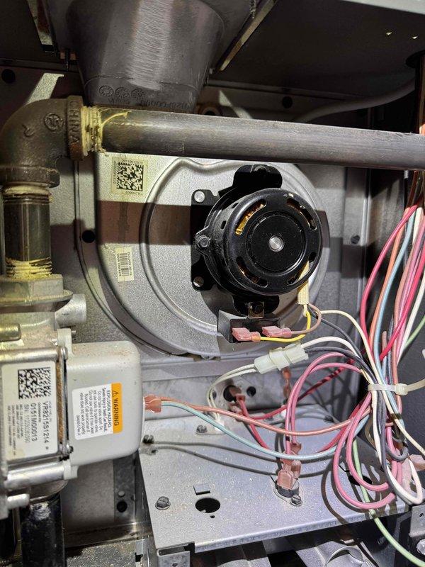 Responded to residential service call for furnace producing buzzing noise during startup with system failure. Upon inspection, diagnosed failed inducer motor assembly causing operational failure and abnormal noise. Replaced defective inducer motor, verified proper electrical connections, tested all safety controls, and confirmed system restored to normal operation with no unusual sounds.