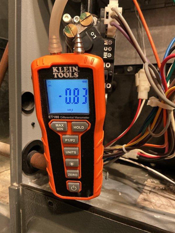 Responded to no heat call where furnace was short cycling. Upon arrival, performed diagnostic testing of gas furnace system. Utilized differential manometer to measure gas pressure at manifold, obtaining readings of 0.87" and 1.94" water column. Inspected control board, electrical connections, and capacitor assembly. Verified all wire terminations were secure and properly connected. Based on pressure readings and system behavior, identified issue causing intermittent operation and corrected problem. System tested and verified operating properly with consistent heat output upon departure.