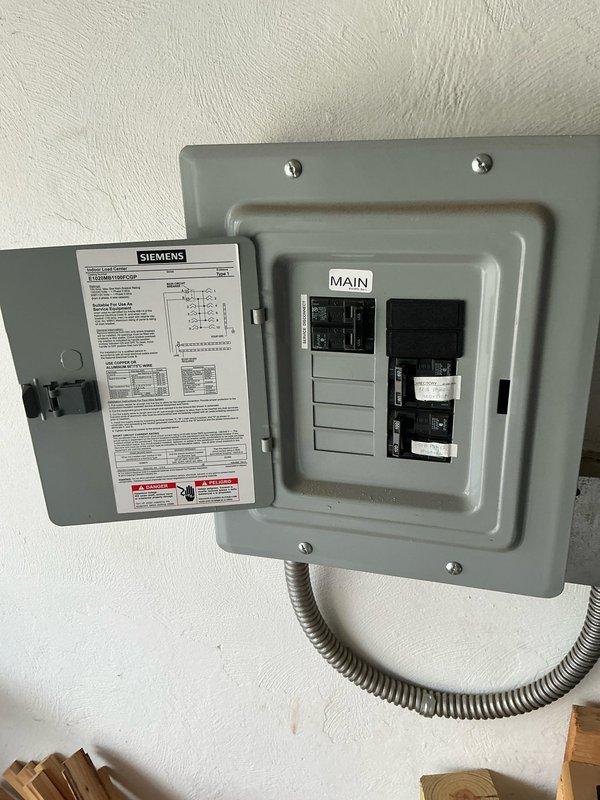 Conducted on-site assessment for HVAC system replacement and air conditioning addition to existing boiler heating system. Evaluated residential space and existing electrical infrastructure to determine feasibility of installing either ductless mini-split or Unico high-velocity air conditioning system. Documented current electrical panel capacity and configuration, noting available breaker spaces and power supply requirements for proposed AC installation in room undergoing renovation.