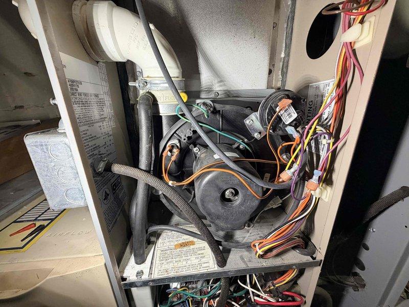 Completed comprehensive heating maintenance on two HVAC systems. Performed thorough inspection of furnace components including draft inducer blower motor assemblies, electrical connections, and wiring harnesses. Verified proper operation of all mechanical systems, checked blower motors, examined combustion chambers, and inspected ventilation piping. All electrical connections were secure with proper wire management in place. Both heating units tested and confirmed operational with no deficiencies noted.