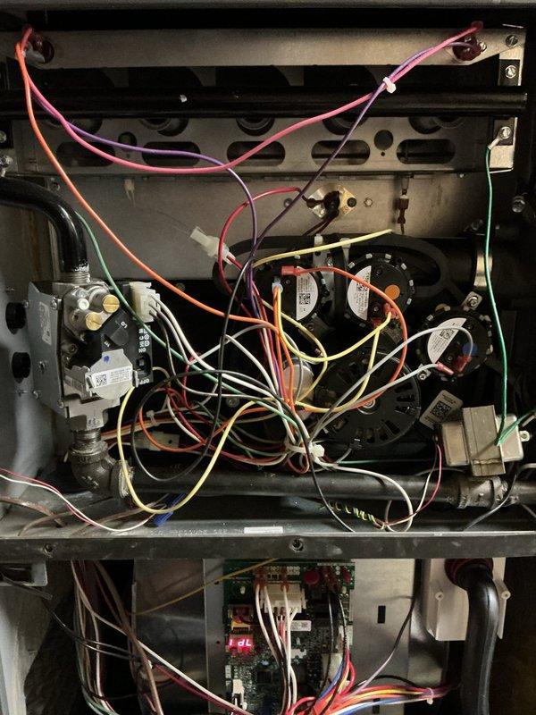 Completed first-year heating maintenance on Goodman furnace system. Performed comprehensive inspection of all internal components including gas valve assembly, blower motors, electrical connections, and control board. All systems tested and confirmed operational with no issues identified during routine preventative maintenance service.