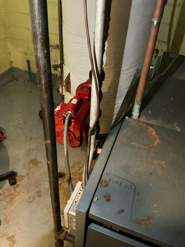 Conducted on-site assessment of existing boiler system in basement mechanical room to provide replacement options. Evaluated current piping configuration, including galvanized steel and copper supply lines, shutoff valves, and distribution system. Documented existing installation conditions and spatial requirements for new boiler equipment recommendations.