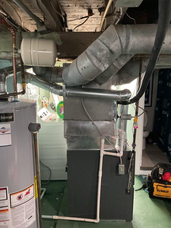 Completed comprehensive heating maintenance on Goodman furnace system in basement utility area. Performed standard seasonal inspection including filter check, burner examination, heat exchanger visual inspection, blower motor operation verification, and ductwork assessment. All components found operating within normal parameters with no immediate repairs required at time of service.