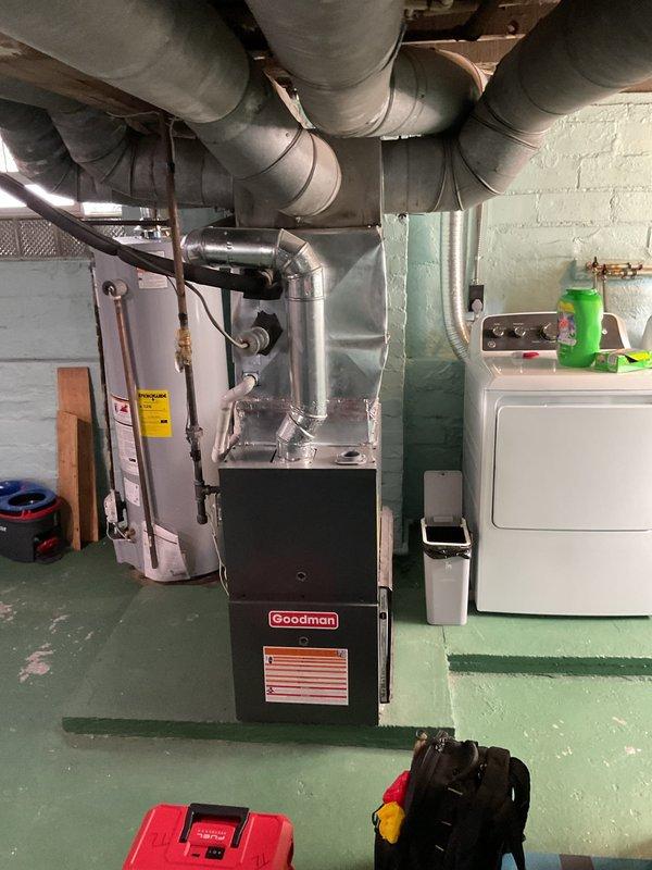 Completed comprehensive heating maintenance on Goodman furnace system in basement utility area. Performed standard seasonal inspection including filter check, burner examination, heat exchanger visual inspection, blower motor operation verification, and ductwork assessment. All components found operating within normal parameters with no immediate repairs required at time of service.