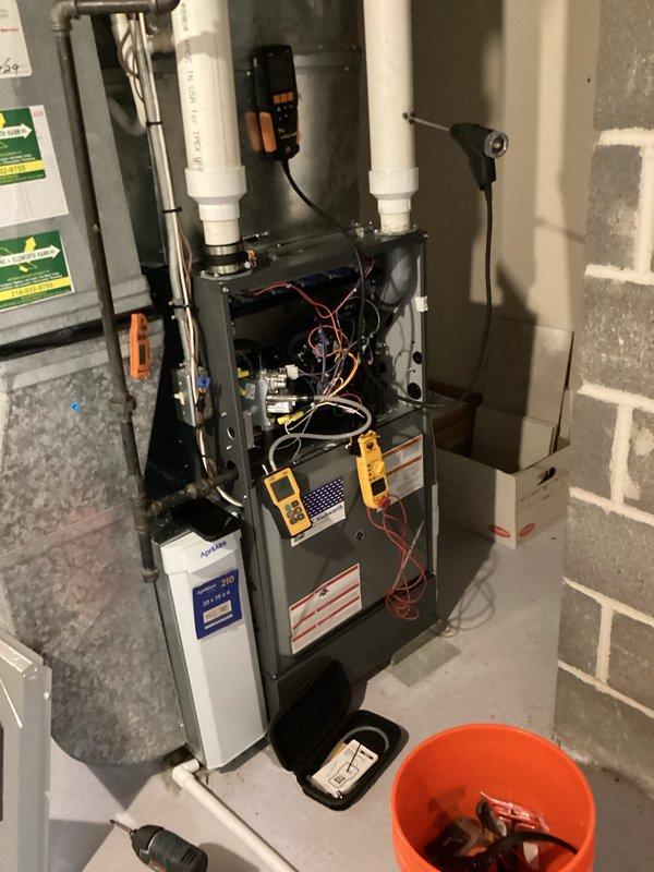Completed comprehensive heating maintenance on gas furnace system. Performed diagnostic testing with digital multimeter to verify electrical components and control board operation, confirming proper voltage readings and system functionality. Inspected internal components including blower assembly, control board wiring connections, and venting system with all measurements within manufacturer specifications.