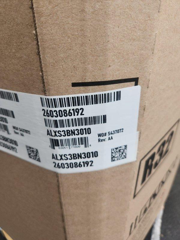 Completed installation of new air conditioning system and evaporator coil at residential property. System included ALXS3BN3010 unit with exterior condenser placement on side of building, proper electrical connections via conduit and dedicated disconnect box mounted to vinyl siding, and refrigerant line set routing along exterior wall foundation. All components tested and operational upon completion.