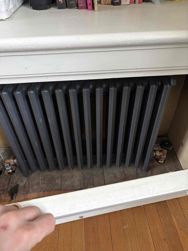 Completed comprehensive HVAC system installation including steam-to-hot water boiler conversion with new piping infrastructure, Unico air handler with ductwork installed in attic space, hot water heating loop with panel radiators, and mini split system. All mechanical systems commissioned and operational with copper supply lines properly connected throughout residence.