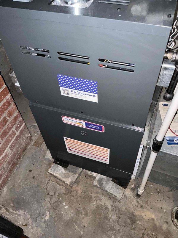 Assessed damaged HVAC condenser unit that sustained impact from tree company operations. Documented existing R-410A system and provided replacement estimate, noting that while R-410A systems manufactured after 2025 phase-out remain serviceable, current unit requires replacement due to physical damage. Photographed unit condition and equipment labels for replacement specifications.