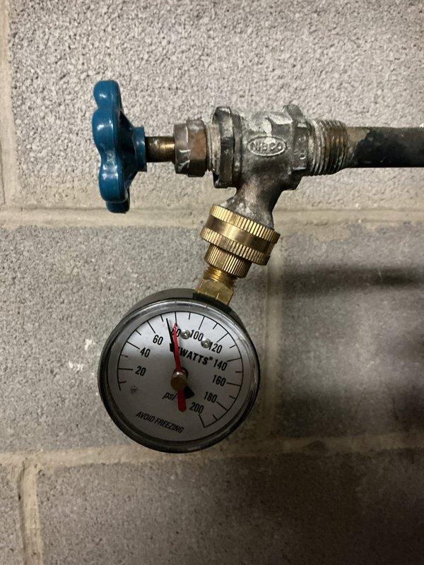 Performed routine maintenance on a Bradford White tanked water heater located in the basement utility area. Completed a full system flush to remove sediment buildup and maintain optimal heating efficiency. Inspected all plumbing connections, including copper supply lines and PVC drain piping. Verified proper operation of the pressure relief valve and confirmed system pressure readings on the gauge were within normal operating parameters. Examined the gas venting configuration and ensured all safety labels and manufacturer specifications were visible and intact. Unit is functioning properly with no leaks detected at connections or tank base.