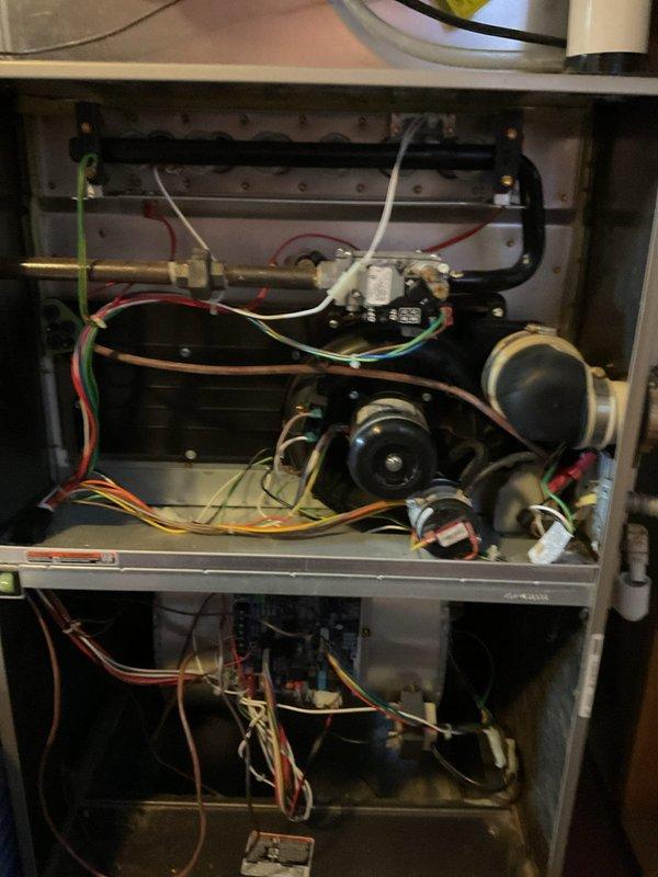 Completed comprehensive heating maintenance on two Carrier furnace systems. Performed thorough inspection of all internal components including blower motor assemblies, heating elements, burner assemblies, electrical connections, and wiring throughout both units. Verified proper operation of integrated humidifier system, checked condensate drainage lines, and ensured all safety controls and electrical connections were secure and functioning correctly.