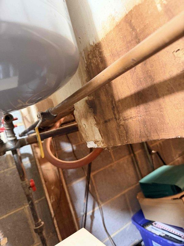 Completed routine boiler maintenance inspection including examination of the Amtrol expansion tank, associated copper piping connections, gas line valves, and related HVAC components. Verified proper operation of system controls, checked for leaks at brass fittings and compression joints, and confirmed adequate clearances around all mechanical equipment in the utility area.