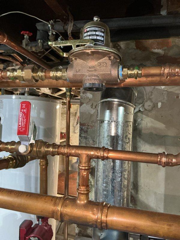 Completed comprehensive boiler heating system maintenance including inspection of circulator pump, expansion tank, pressure relief valve, and all copper piping connections. All components were found to be operating within normal parameters with no leaks detected, and system pressure was verified at proper levels for optimal heating performance.