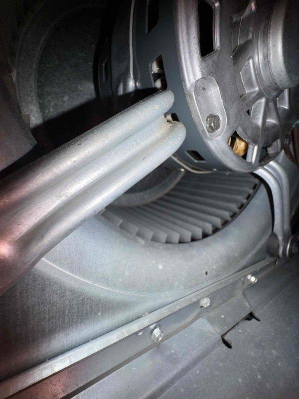 Responded to customer complaint of unusual noise from furnace. Performed thorough inspection of internal components including heat exchanger, blower assembly, and ductwork. Conducted combustion analysis using Testo 310 analyzer, which measured carbon monoxide levels at 11 ppm and flue temperature at 70°F. All readings within normal operating parameters. Inspected blower motor, mounting brackets, and condensate pan for loose components or debris that could cause noise. System operating safely with proper combustion efficiency.