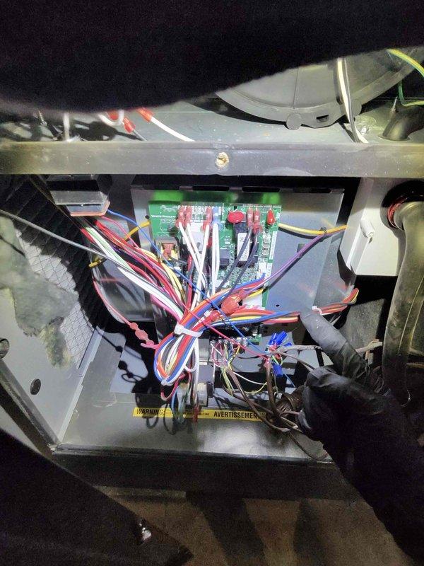 Performed comprehensive heating system maintenance inspection on residential furnace unit. Accessed internal components to examine control board wiring connections, verifying all wire terminations were secure and properly seated. Conducted combustion analysis testing using calibrated Testo 310 analyzer, recording temperature and CO readings to ensure safe and efficient burner operation within manufacturer specifications.
