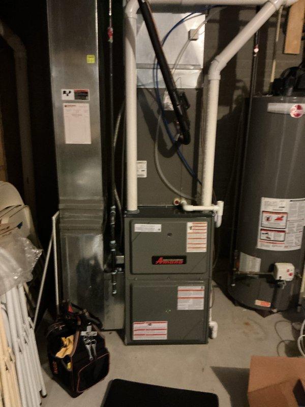 Responded to no cooling call on 6-month-old Amana central air conditioning system with gas furnace located in basement. Upon arrival, confirmed system was not operating in either heating or cooling mode. Performed diagnostic evaluation of the complete HVAC system including electrical connections, thermostat communication, and refrigerant circuit. Inspected furnace control board, blower motor operation, and condensate drainage system. Verified all safety switches, pressure switches, and limit controls for proper function. Checked air handler and evaporator coil for airflow restrictions. System covered under manufacturer warranty. Documented equipment model numbers and captured photographic evidence of installation and current system condition for warranty claim processing.