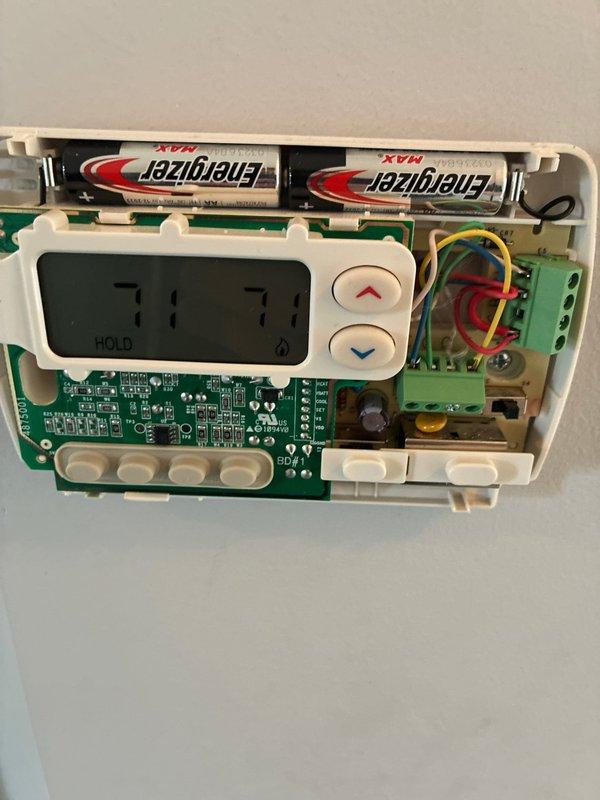 Conducted full system replacement estimate for aging HVAC system originally installed in 2009. Documented existing electrical service equipment including Siemens outdoor panel, digital electric meter, and associated conduit routing, as well as current thermostat configuration with programmable digital controls and HVAC wiring connections. Provided comprehensive replacement options for complete system upgrade.