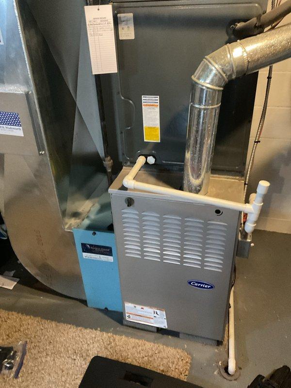 Completed scheduled heating maintenance on residential Carrier furnace system. Performed comprehensive inspection of furnace unit, air handler, ductwork connections, and ventilation components. Verified proper operation of all system controls, checked gas line connections, and inspected condensate drain lines for proper flow. Examined flexible and rigid ductwork for secure mounting and proper sealing. All equipment found in good operational condition with no immediate repairs required. System operating within manufacturer specifications.