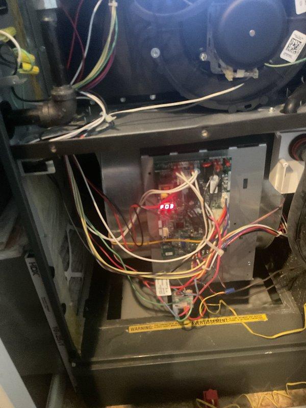 Completed annual preventive maintenance inspection on residential gas furnace system as part of scheduled maintenance program. Performed comprehensive system evaluation including visual inspection of all internal components, blower motor assembly, gas valve operation, burner assembly, electrical connections, and control board functionality. Verified proper wiring connections throughout unit, checked all safety labels and manufacturer specifications were intact and legible. Accessed interior compartments to inspect compressor connections, circuit board condition, and electrical wiring integrity. All components found operating within normal parameters with no deficiencies noted. System returned to full operational status following completion of routine maintenance procedures.