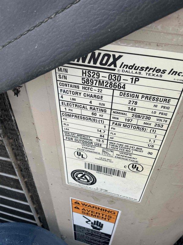 Completed HVAC system evaluation for equipment replacement options. Documented existing Comfortmaker air handler/furnace unit in interior mechanical closet with PVC condensate drainage system and copper refrigerant lines. Assessed outdoor Lennox condensing unit model HS29-030-1P utilizing R-22 refrigerant. Photographed equipment specifications, installation configuration, and current system condition to provide comprehensive replacement recommendations.