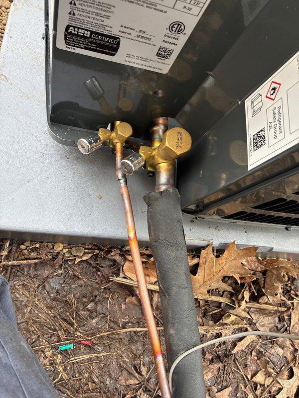 Completed full HVAC system installation including 96% efficiency furnace and air conditioning unit. Installed new outdoor condenser unit with refrigerant lines, service valves, and electrical disconnect equipped with Ferraz Shawmut TR45R 45-amp time-delay fuses rated for 440V AC. System tested and operational upon completion.