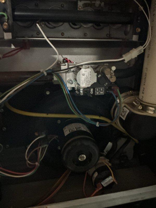 # HVAC Heating System Maintenance

Performed comprehensive heating system maintenance on residential furnace unit. Conducted thorough inspection of all electrical components, control board, and blower motor assembly. Verified proper wire connections at terminal blocks and control module, ensuring all electrical connections were secure and properly terminated. Inspected transformer, circuit board components, and relay controls for proper operation. Checked blower motor assembly and associated wiring for signs of wear or damage. Tested system controls including ON/OFF functionality and verified all safety interlocks were operating correctly. All components found to be in serviceable condition with normal operational wear. System tested and confirmed to be functioning within manufacturer specifications.