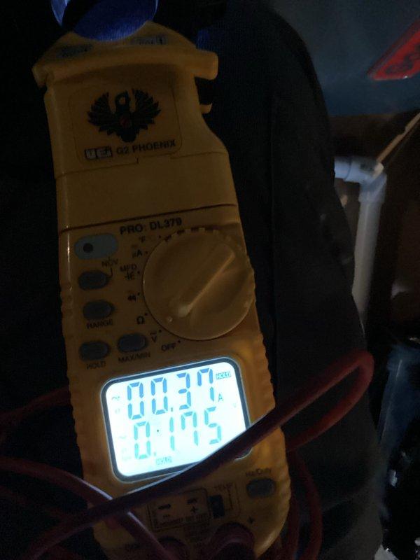 Completed routine heating maintenance inspection on HVAC system. Performed electrical diagnostics using clamp meter, recording amperage draw of 0.37A and verifying proper voltage readings at control board. Inspected circuit board connections, wiring harnesses, and all electrical components for proper operation and secure connections.