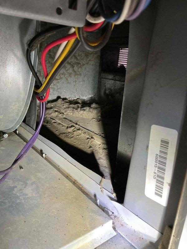 Completed routine heating maintenance inspection on HVAC system. Accessed interior components through main service panel, inspected electrical connections and wiring harnesses for proper termination and signs of wear, verified compressor unit condition, and examined refrigerant line insulation and valve assemblies. Cleaned accumulated dust and debris from interior compartment and surrounding surfaces to ensure optimal airflow and system efficiency.