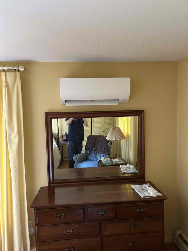 Completed installation of a 4-head Daikin ductless mini-split HVAC system in residential property. Mounted indoor air handler units in multiple rooms including bedrooms, with proper wall placement for optimal air distribution and aesthetic integration. All units tested and confirmed operational upon completion.