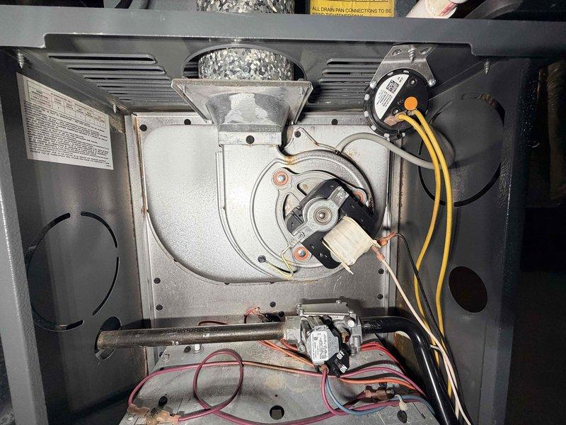Completed comprehensive heating maintenance on Goodman furnace system. Performed thorough inspection of blower motor assembly, verified electrical connections, tested control board functionality, and examined all internal mechanical components with access panels removed. Inspected PVC condensate drainage system, ductwork insulation integrity, and confirmed proper system operation using diagnostic testing equipment.