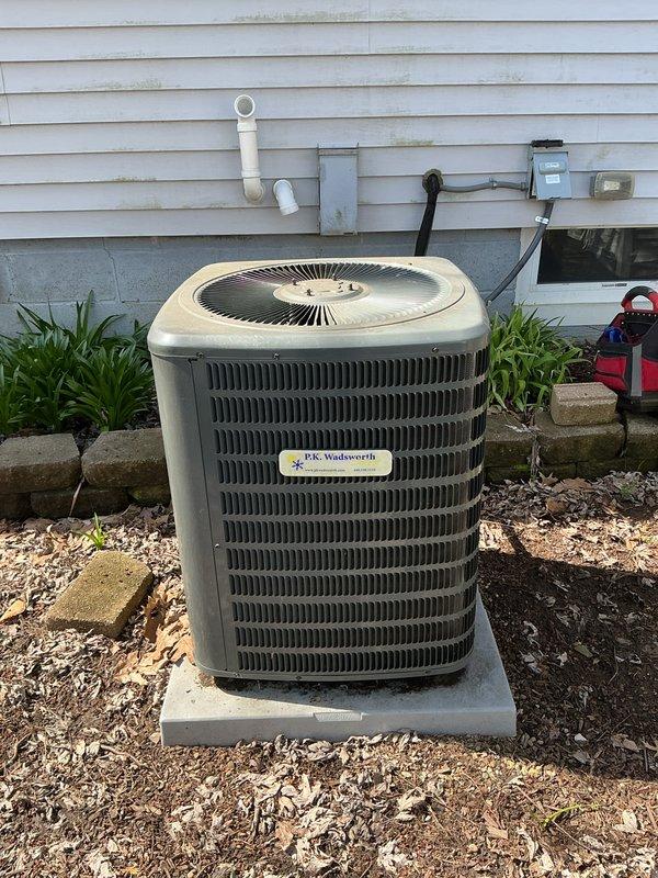 Completed routine cooling season maintenance on residential HVAC system. Performed comprehensive inspection of indoor air handler unit located in crawlspace, including examination of evaporator coil, blower assembly, condensate drain lines, and electrical connections. Verified proper operation of all safety controls and measured system amperage. Inspected outdoor condenser unit, confirmed adequate airflow through coil fins, checked refrigerant lines and electrical disconnect, and verified unit is level on concrete pad with proper clearances maintained. System operating within normal parameters with no deficiencies noted.