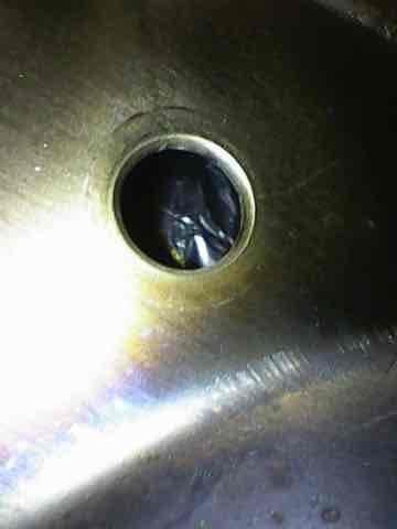 Completed comprehensive MVP maintenance on heating and cooling system. Performed airflow measurements at supply register using digital manometer, recording 588 CFM to verify proper system performance. Inspected and assessed condensate drain assembly for proper operation and drainage functionality.