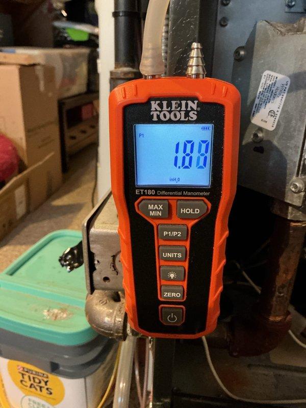 Completed comprehensive heating maintenance on HVAC system including full inspection of control board, electrical connections, and wiring harnesses. Verified proper operation of all electronic components and safety controls within air handler unit. Conducted static pressure testing using differential manometer, recording measurement of 188 inches of water column to assess airflow and system performance.