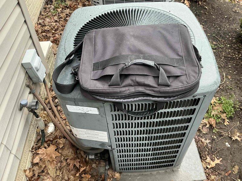 Provided HVAC replacement estimate for outdoor air conditioning unit with multiple access options. Existing furnace is four years old and in good condition, requiring only AC system replacement. Unit location offers easy access for installation, with existing electrical disconnect and refrigerant line routing already in place along exterior wall.