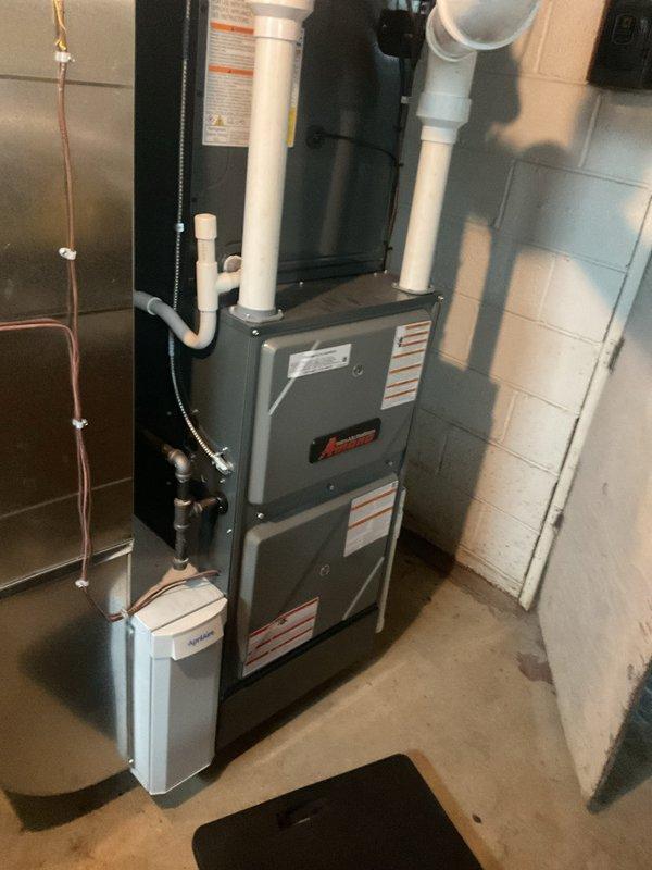 Completed annual preventive maintenance inspection on residential gas furnace system as part of recurring service agreement. Performed comprehensive system evaluation including burner inspection, heat exchanger examination, blower motor operation check, air filter assessment, thermostat calibration verification, and safety control testing. Inspected humidifier unit mounted to furnace, verified proper drainage and water supply connections. Confirmed all ductwork connections secure, refrigerant lines properly mounted, and gas line connections tight with no leaks detected. System operating within manufacturer specifications with all safety controls functioning properly.