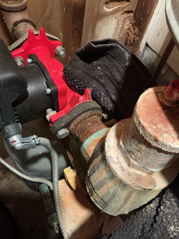 Responded to emergency no-heat call on 6-9 year old furnace system. Installed previously ordered replacement part to restore heating functionality. Upon inspection, identified and addressed corroded plumbing connections and pump assembly components showing significant oxidation and deterioration. Completed repairs, tested system operation, and verified proper heating output restored to residence.